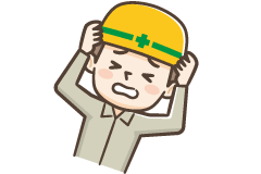 頭を抱える作業員